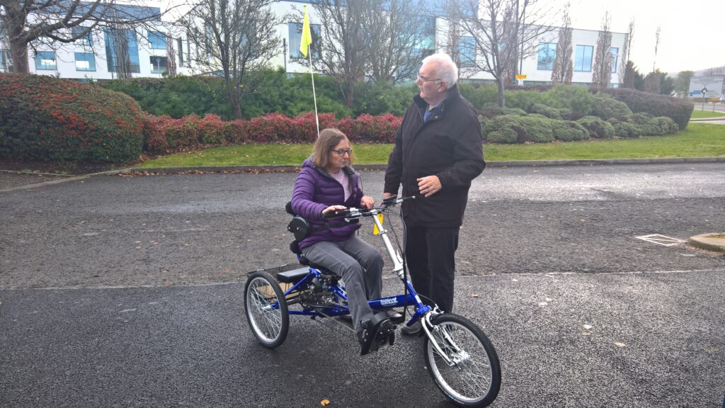 Bob Griffin explaining how Judy needs to ride her trike Bob Griffin explaining how Judy needs to ride her trike